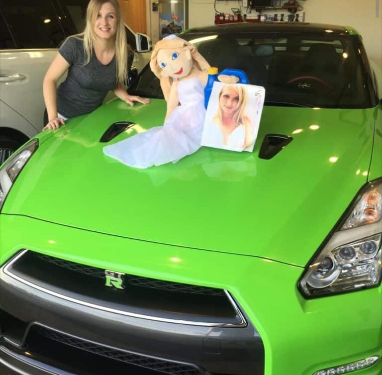 married woman and selfie on car